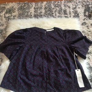 Kate Hudson’s Happy by Nature top.